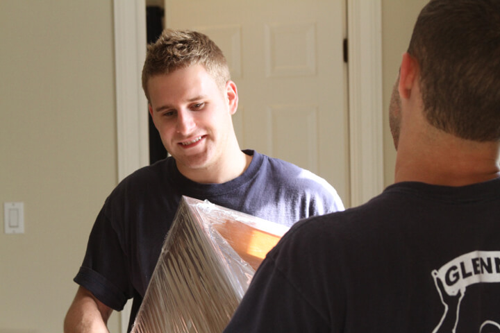 movers on a residential moving job