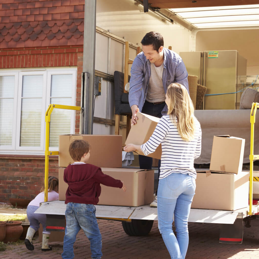 Family loading up a moving truck